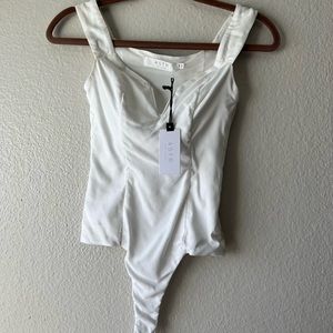 NYT Beautiful structured sweetheart neck bodysuit